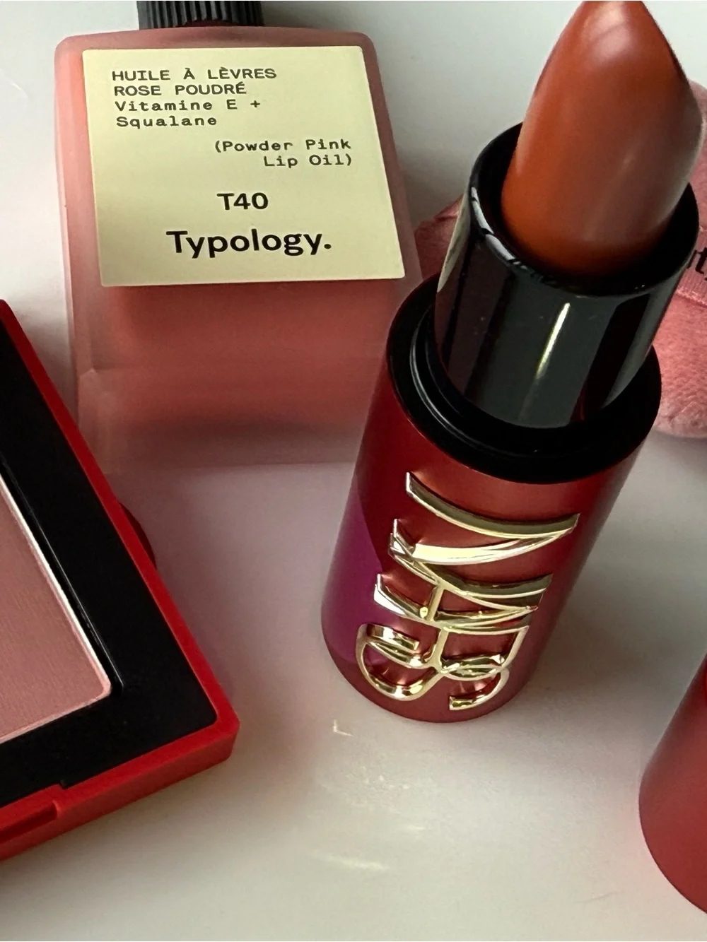 NARS Blush & Lipstick + Typology Lip Oil + Huda Puff